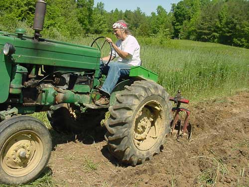 Cathy on tractor