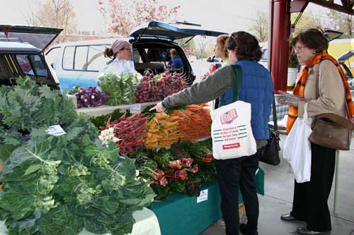 Customers check out the Castlemaine produce