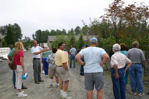 Will Jinnette talks with group about trees