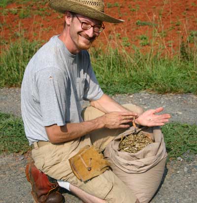 John shows some of the harvest of oilseed radish