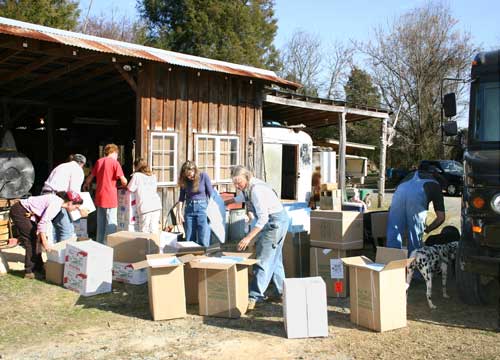 unloading boxed potatoes