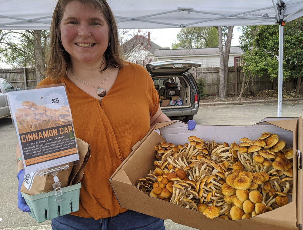 Laura Stewart with her beautiful and tasty Haw River Mushrooms at the Pittsboro Farmers' Market. 