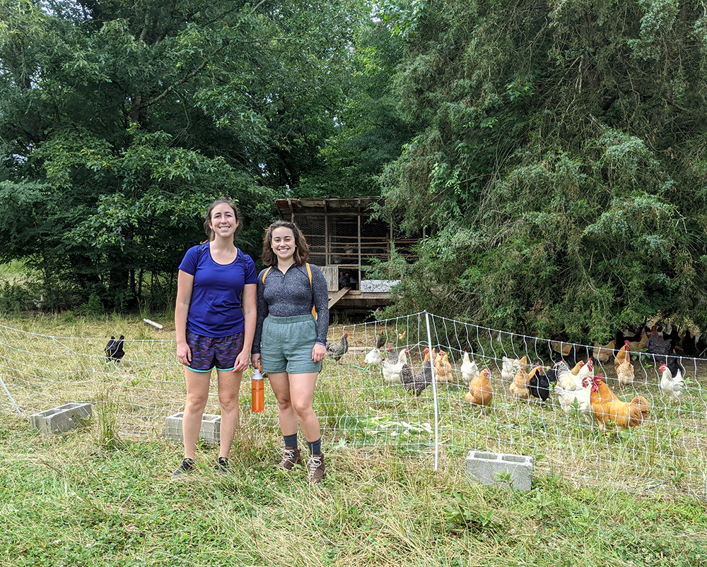 Two women with chickens