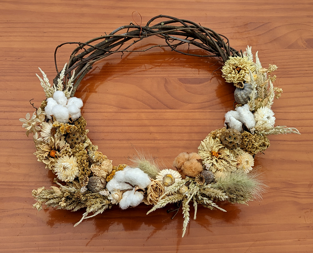 Wreath made from dried locally grown flowers at Heart Song Farm at the Pittsboro Farmers' Market. 