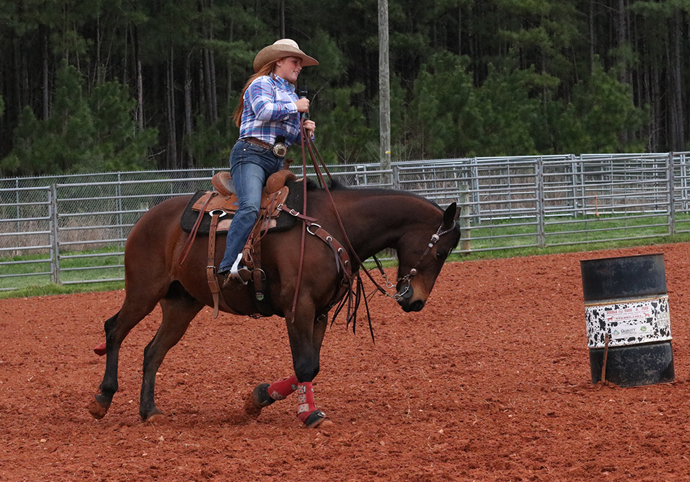 Willow Griffith talked about barrel racing and did a slow speed demo due to the wet ground.