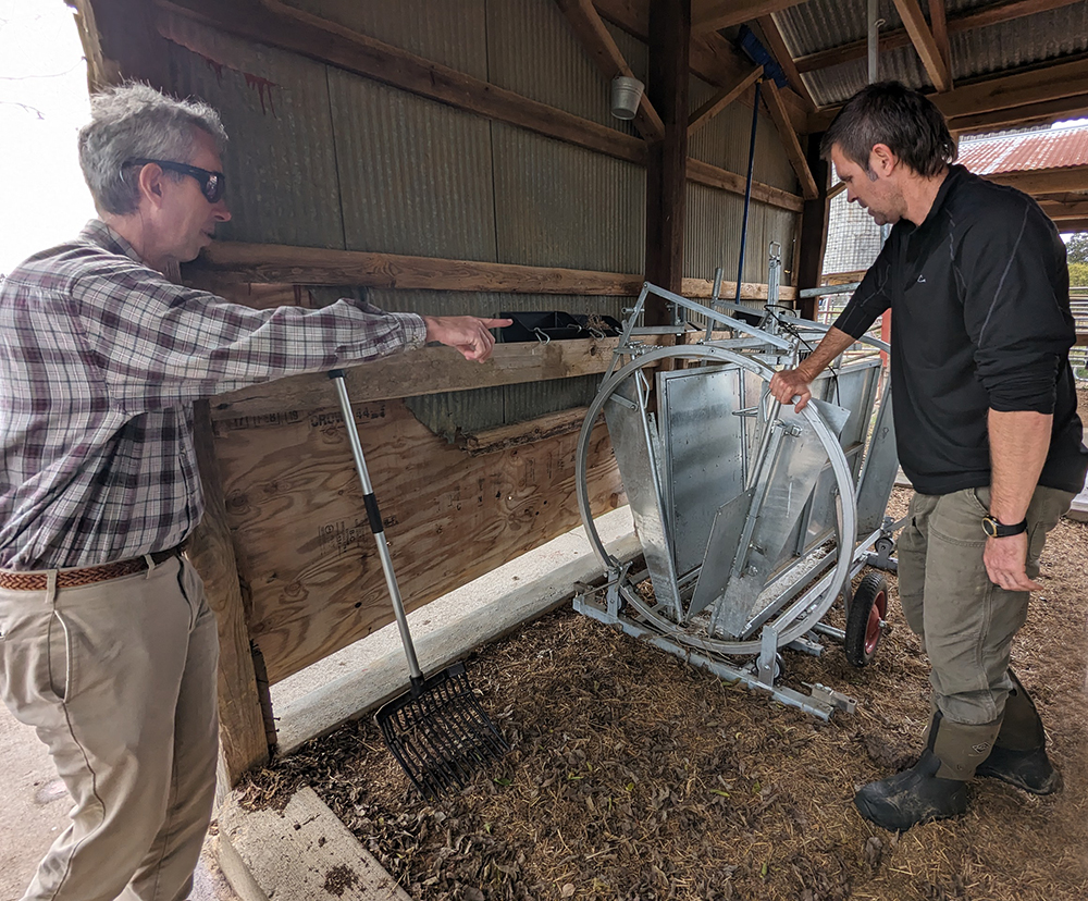 Jeff talks with Bobby about a piece of sheep handling equipment he purchased with AgVentures grant funds. The 