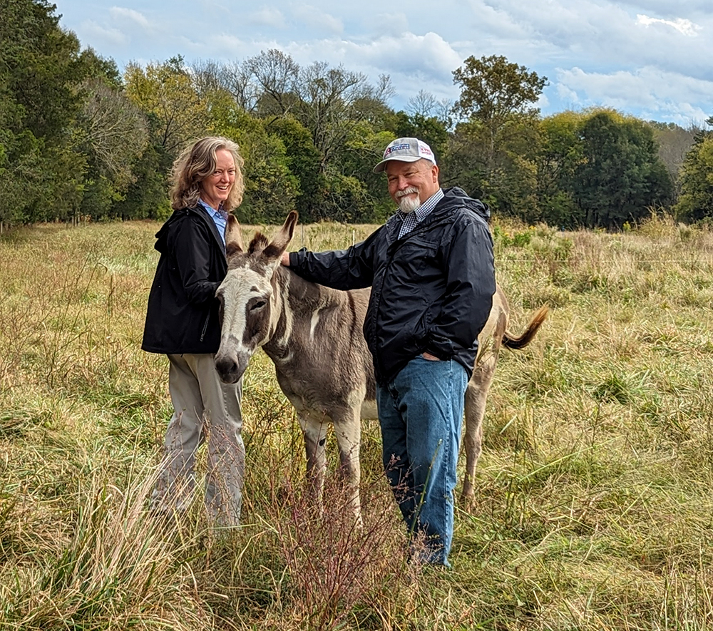 Susan and Dale with Zoe the guardian donkey