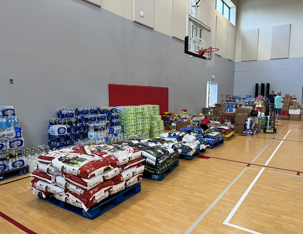 Donated feed and supplies from Pittsboro Feed and Pittsboro Pet Supply being held at The Lamb's Chapel in Burlington for delivery to western NC.